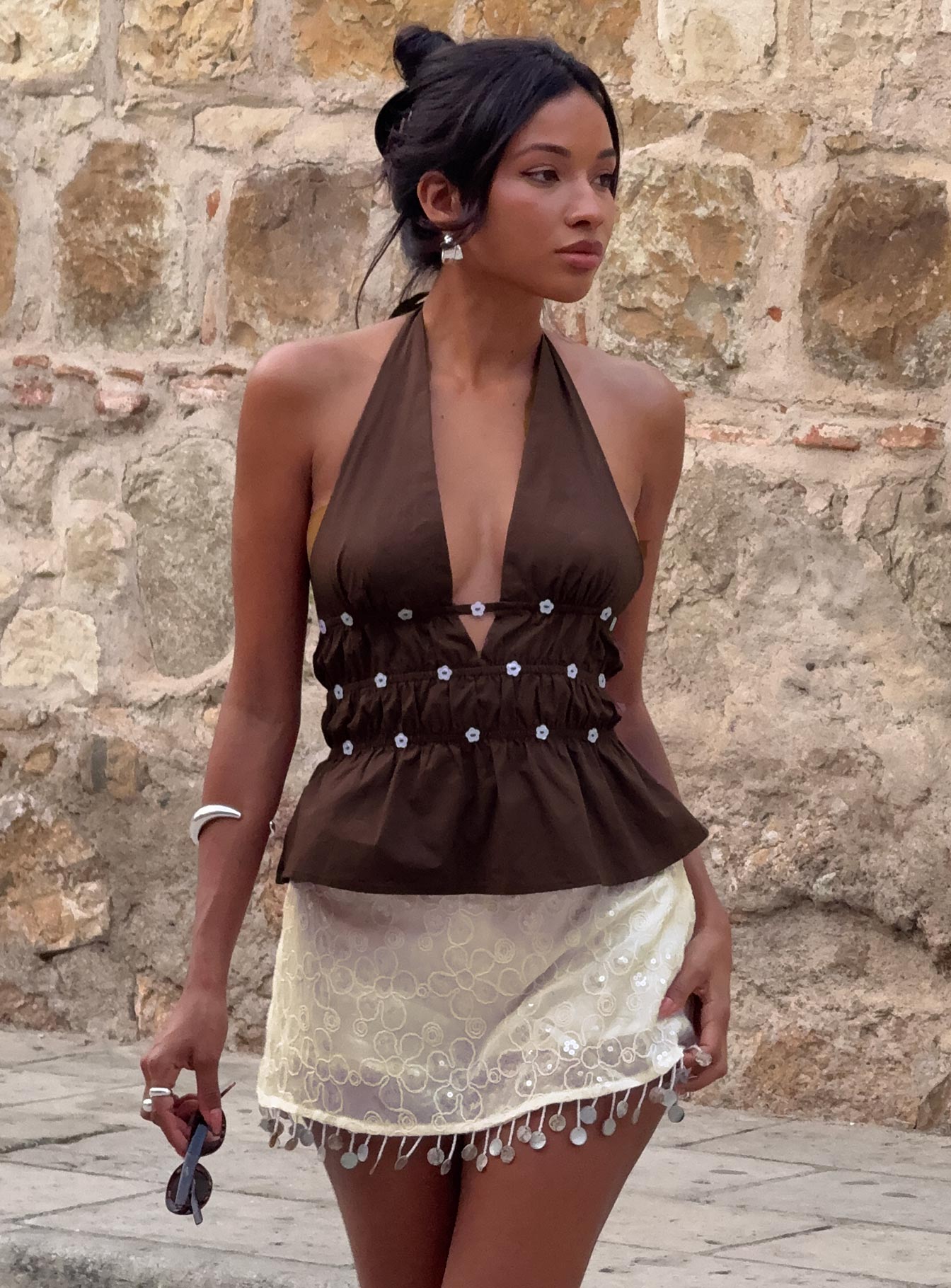 front view of model wearing Princess Polly Movies End Halter Top Brown Sleeveless Plunger 