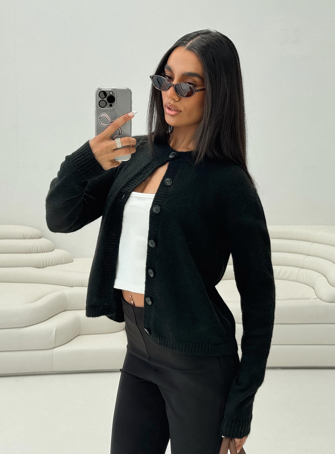 side view of model wearing Princess Polly Denmark Cardigan Black Cropped Jumpers Jumpers 