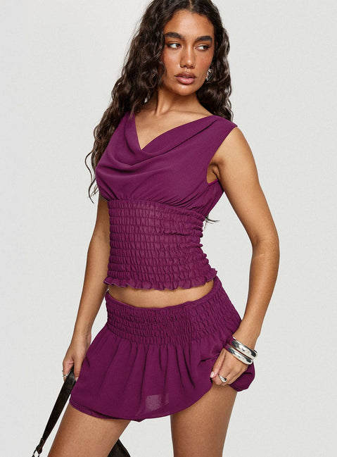   side view of model wearing Princess Polly I Belong Shirred Mini Skirt Wine Mini Skirts Skirts 