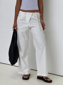 front view of model wearing Princess Polly Leyah Tie Side Pants White Low Rise Pants 