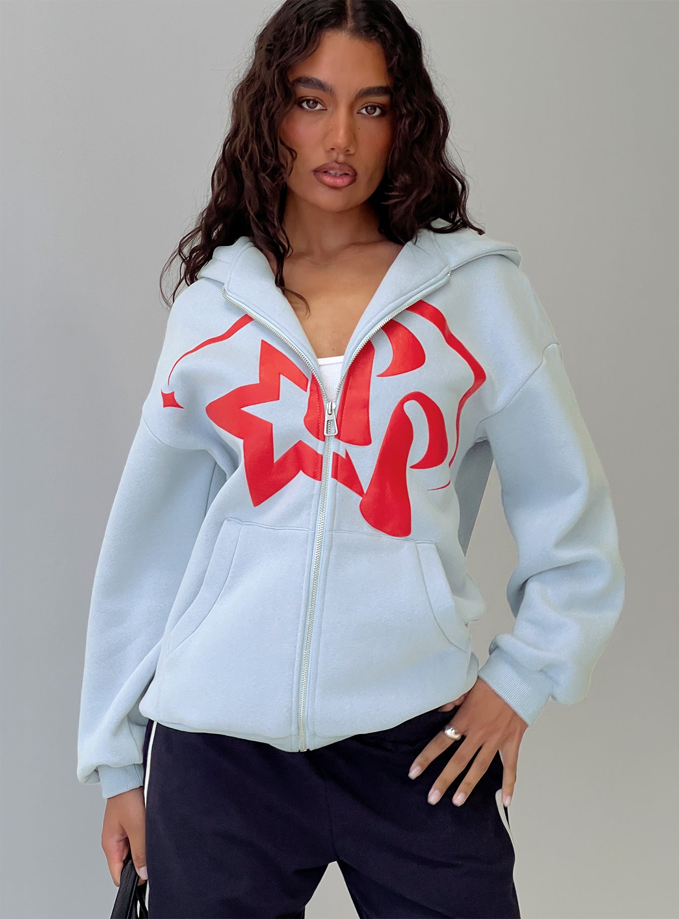 front view of model wearing Princess Polly Starblazer Zip Up Graphic Hoodie Blue / Red Long 