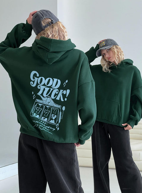 back view of model wearing Princess Polly Good Luck Graphic Hoodie Green / Blue Long 