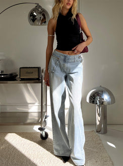 front view of model wearing Princess Polly Paltrow Mid Rise Wide Leg Cargo Jeans Faded Blue Wash Mid Rise Jeans 