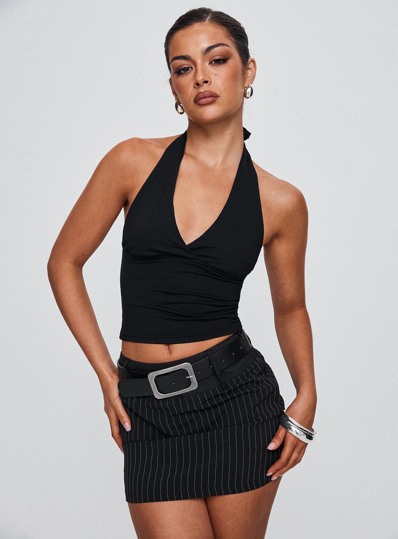   front view of model wearing Princess Polly Christel Pinstripe Skort Black Mini Skirts 