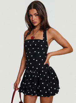 side view of model wearing Princess Polly Gigli Bubble Hem Mini Dress Polka Dot Square Neck 