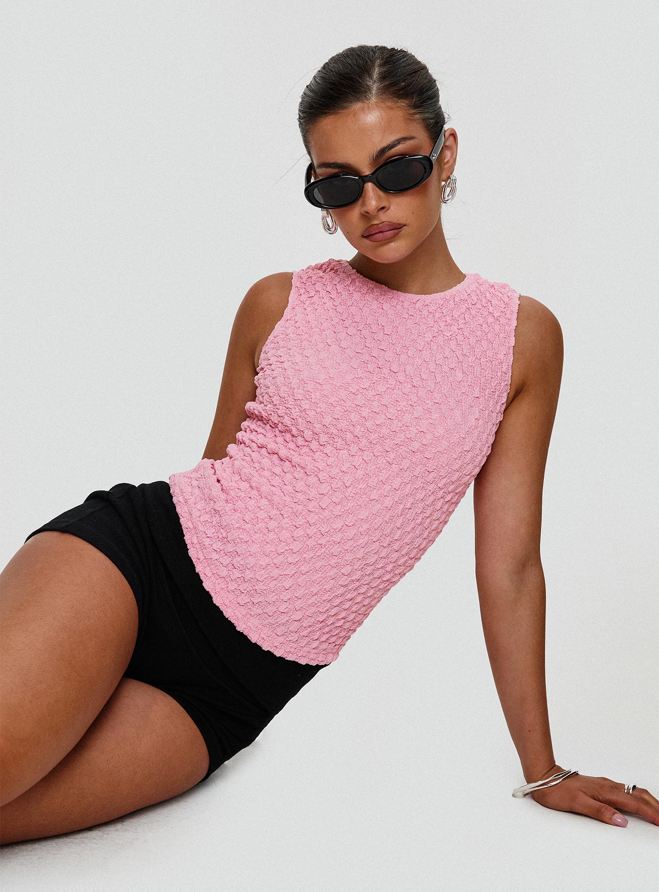back view of model wearing Princess Polly Goodnight And Go Textured Top Pink Sleeveless Crew Neck 