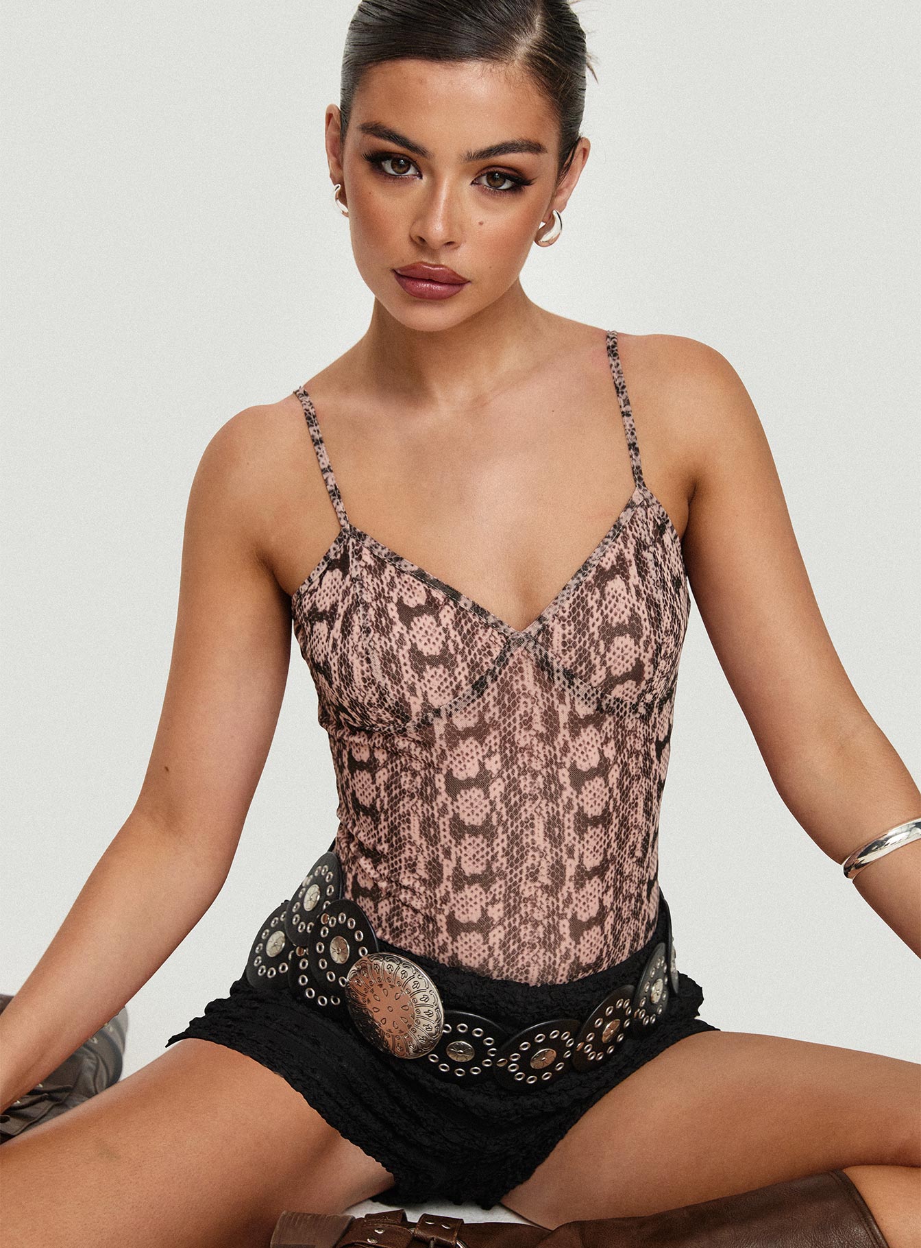 front view of model wearing Princess Polly Elixia Bodysuit Snake Sleeveless 