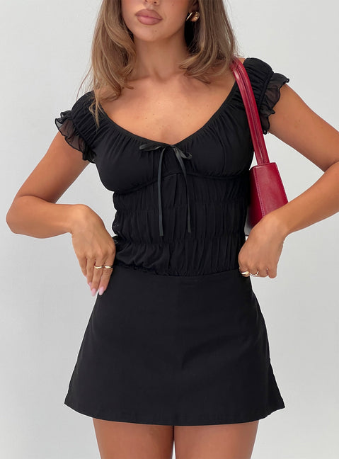 front view of model wearing Princess Polly Ahead Of Myself Off Shoulder Bodysuit Black Short Sleeves 