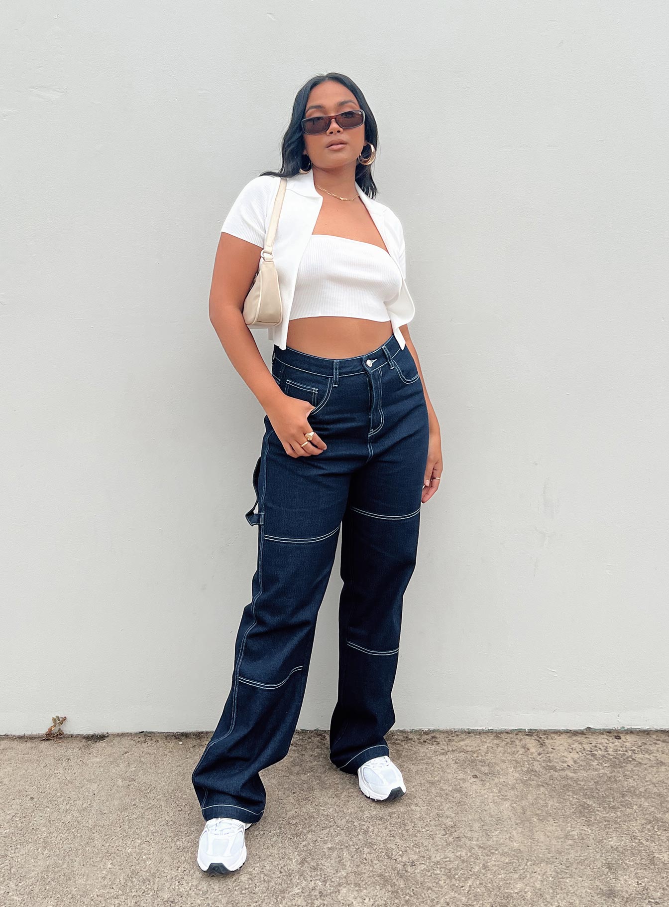 Relaxed fit jeans Zip & button fastening  Classic five pocket design  Belt looped waist 