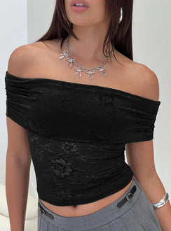 side view of model wearing Princess Polly Werrender Off The Shoulder Top Black Short Sleeves straight 