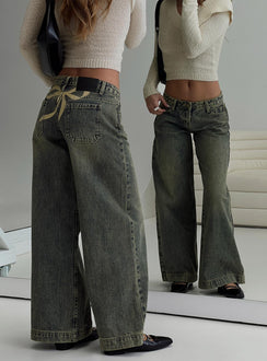 back view of model wearing Princess Polly Ribbon Stamp Wide Leg Jeans Antique Wash Mid Rise 