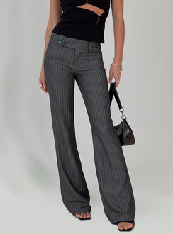 back view of model wearing Princess Polly Kinkirk Flared Pants Grey Pinstripe Tall Low Rise Pants 