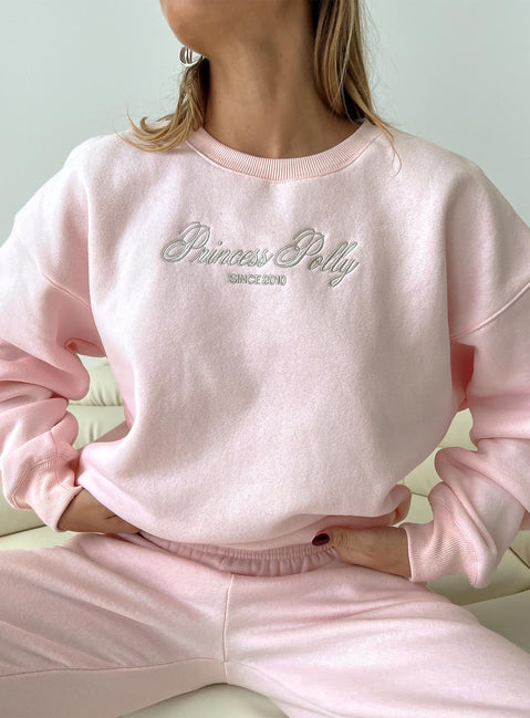 front view of model wearing Princess Polly Princess Polly Crew Neck Sweatshirt Script Baby Pink / Grey 