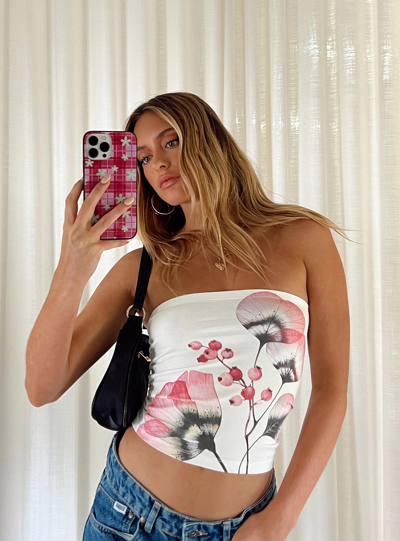 Front view of model wearing  front Princess Polly Sleeveless Asymmetric Neckline  Jasmyne Tube Top White