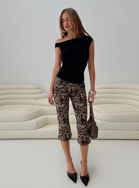side view of model wearing Princess Polly Firecracker Capri Pants Leopard High Waisted Pants 