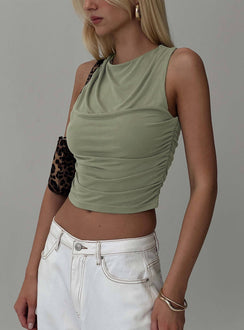 side view of model wearing Princess Polly Hold Em High Neck Top Green Sleeveless Crew Neck 