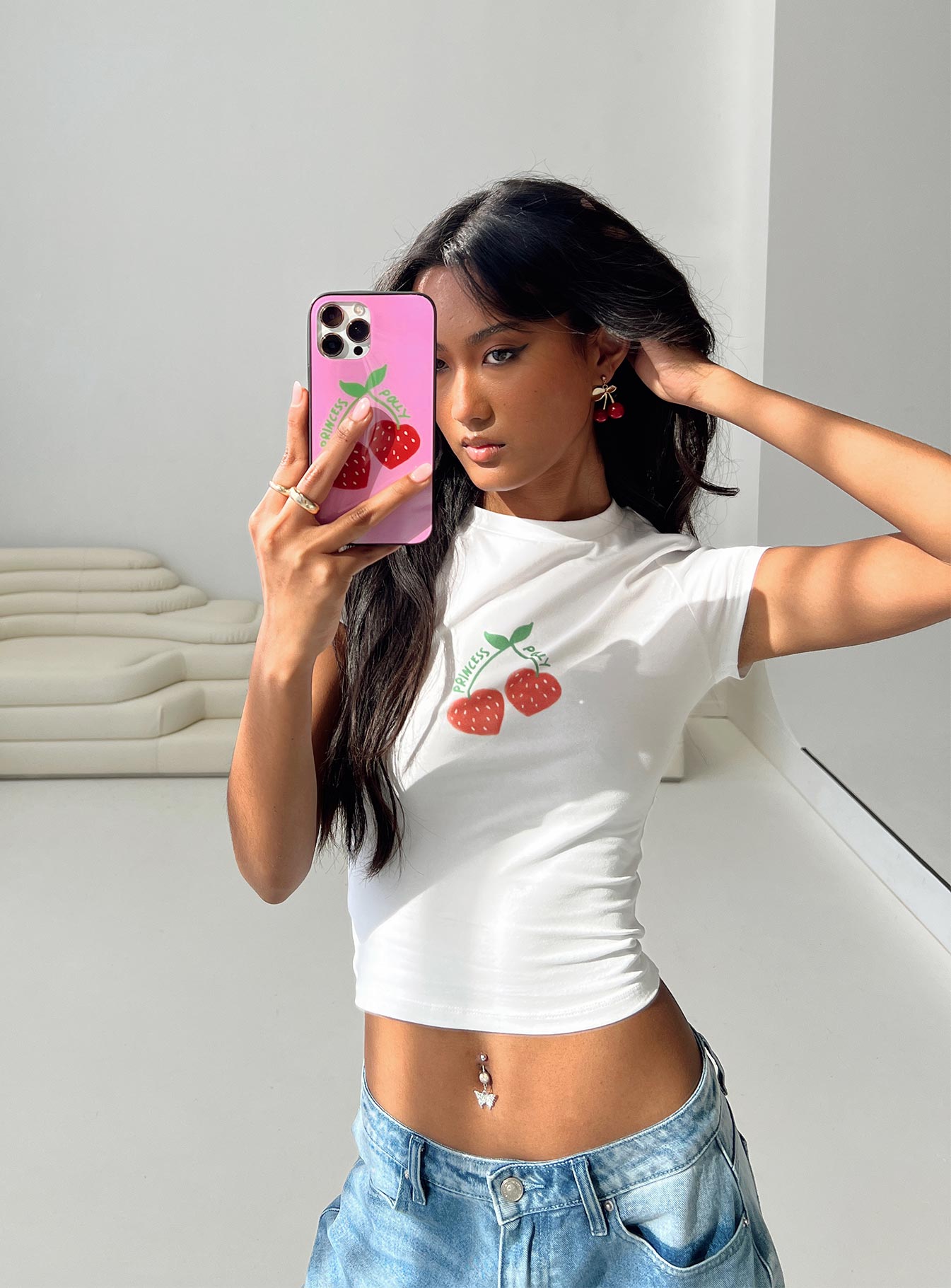 Front view of model wearing  front Princess Polly Short Sleeves Crew Neck  Cherry On Top Baby Tee White