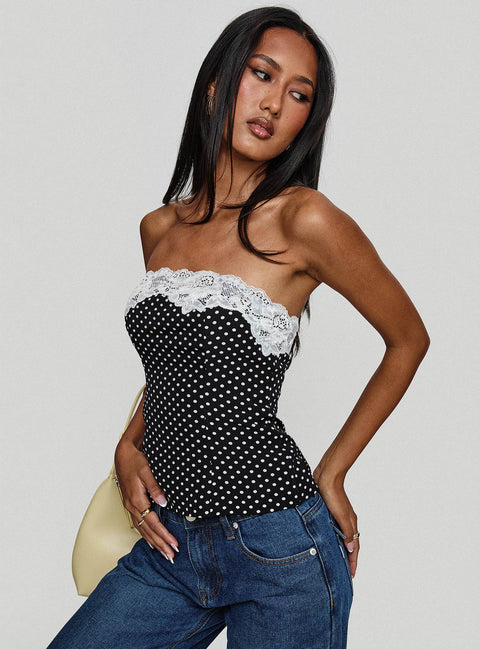 side view of model wearing Princess Polly Ettore Lace Trim Strapless Top Black Polka Sleeveless straight 