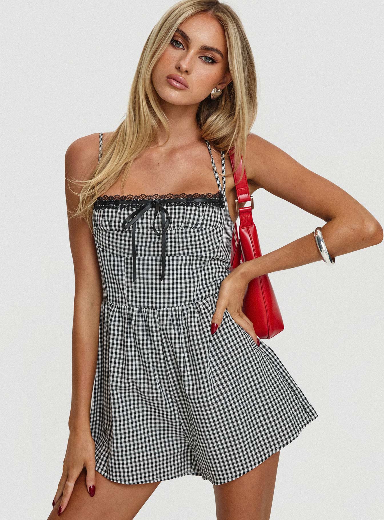 Romper Gingham print, adjustable straps,  lace trim detail, invisible zip fastening Non-stretch material, fully lined 