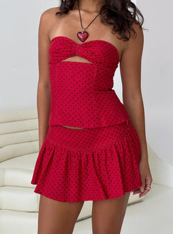 back view of model wearing Princess Polly Tovie Frill Linen Blend Skort Red Polka Low Rise Shorts 