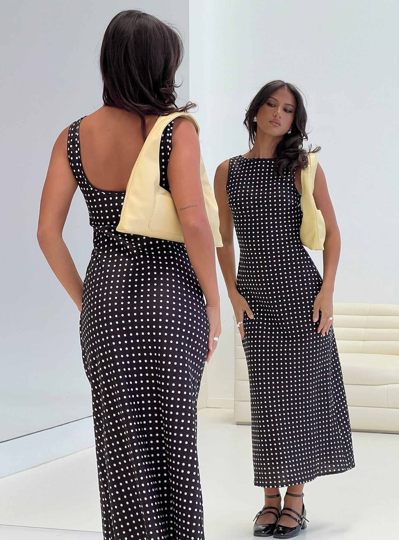 back view of model wearing Princess Polly Voyager Linen Blend Midi Dress Black Polka Crew Neck 