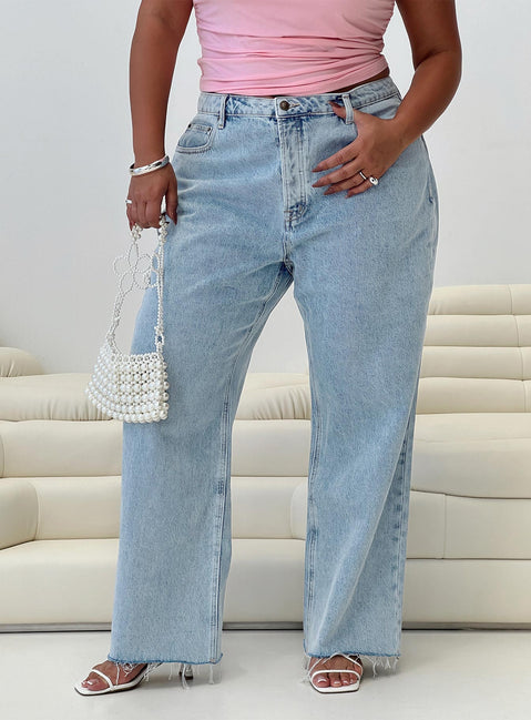 side view of model wearing Princess Polly Fawcett High Rise Straight Leg Jeans Light Blue Wash Curve High Rise Jeans Jeans 