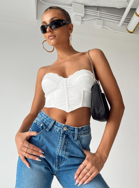 front view of model wearing Princess Polly Altona Strapless Top White Sleeveless Sweetheart 