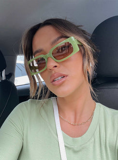 Sunglasses  100% Plastic UV 400 Rectangle style Transparent frame  Beige tinted lense 