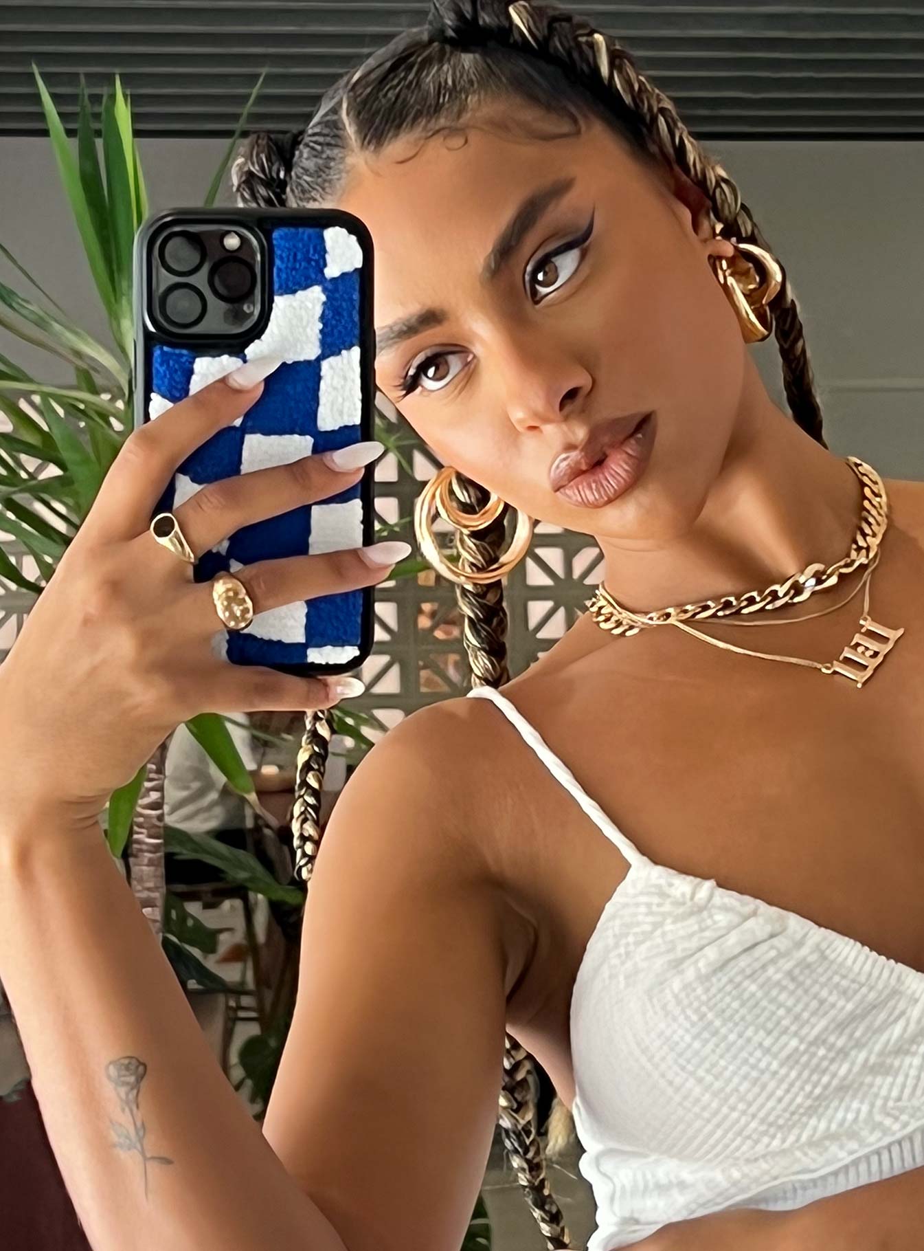 iPhone case Princess Polly Exclusive 50% plastic 50% polyester Faux fur material Check print  Rubber edges 