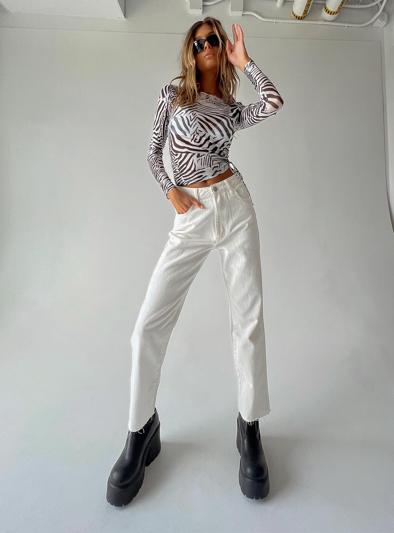 front view of model wearing Princess Polly Harrow Straight Leg Denim Jeans White High Waisted 