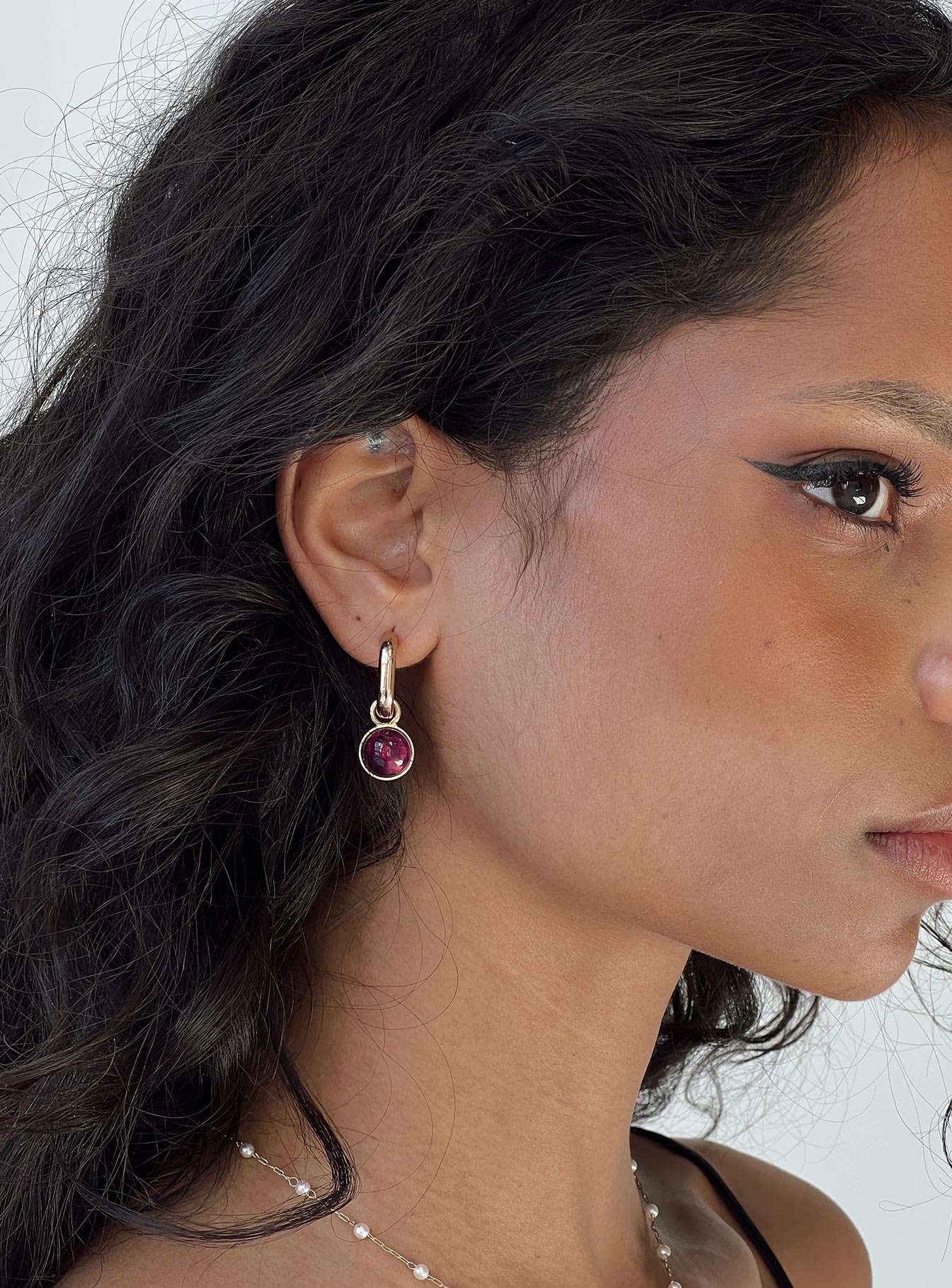 Earrings Gold toned  Gemstone detail Stud fastening