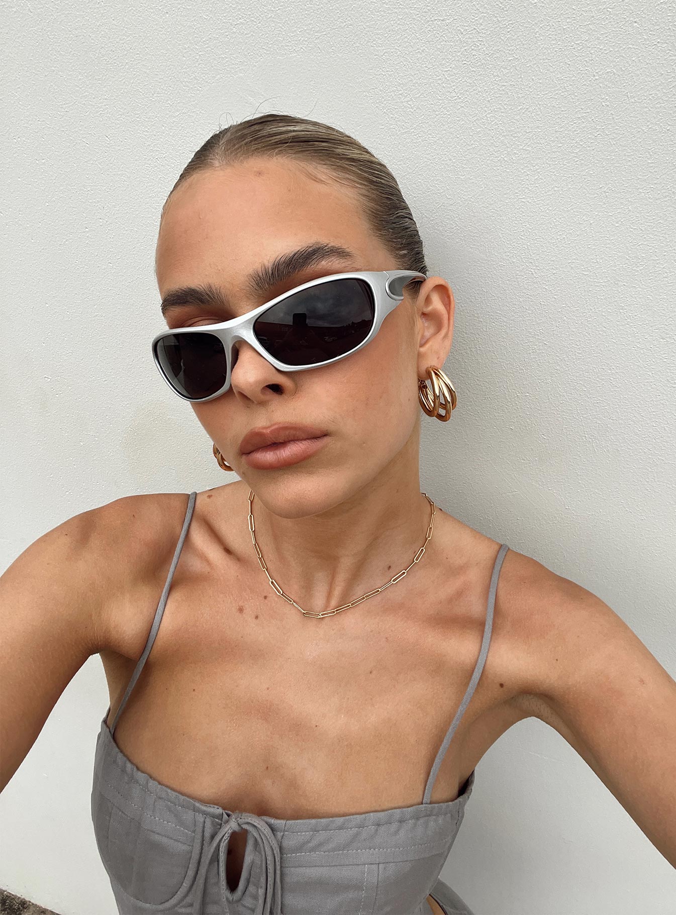 Sunglasses UV 400 Wrap around style  Black tinted lenses  Lightweight 