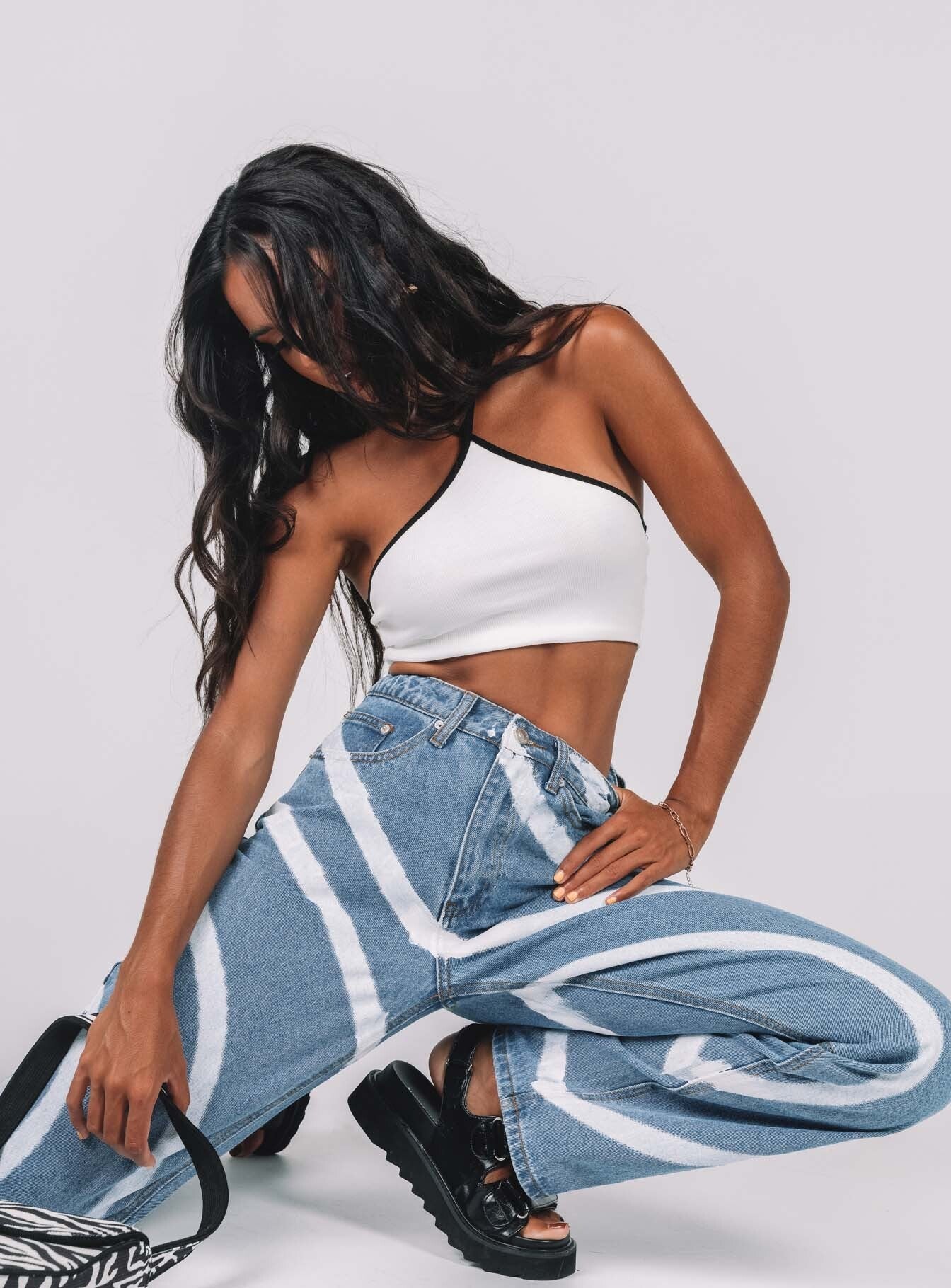 side view of model wearing Princess Polly Sarah Denim Jeans Mid Rise 