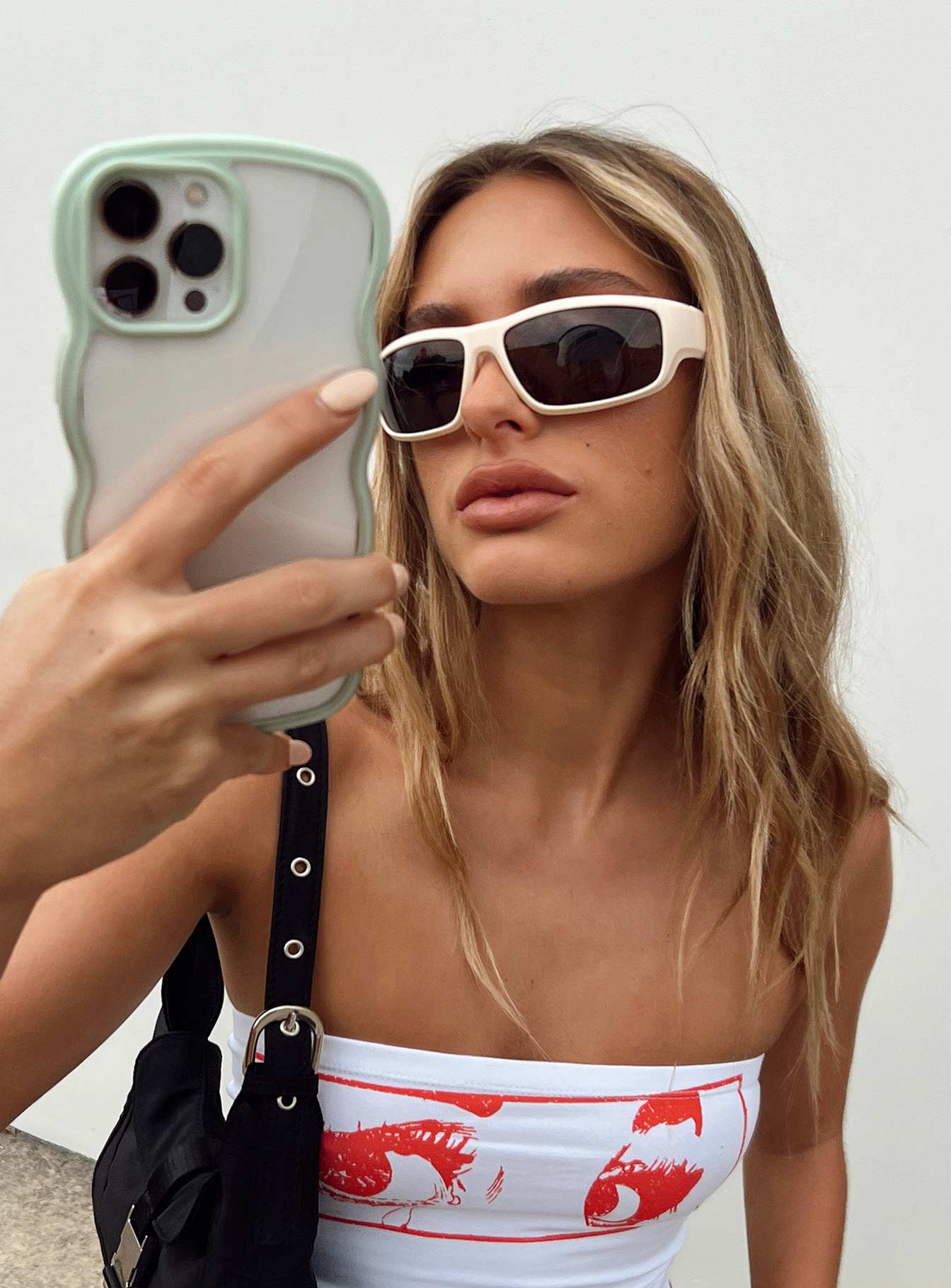 Sunglasses  Tinted lenses  Moulded nose bridge 