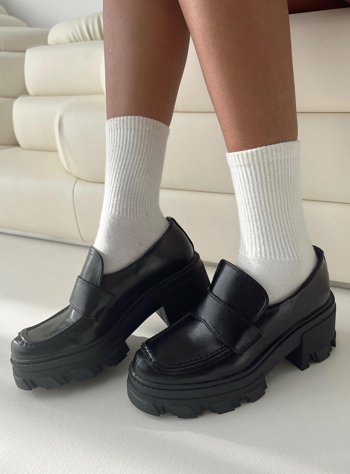 Faux leather loafer Rounded toe, platform base, padded footbed, treaded sole