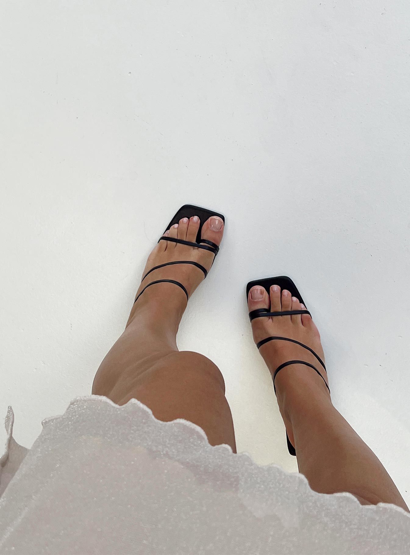 Heels Faux leather material Strappy upper Toe ring Mid sculptural block heel Open square toe Slip-on design