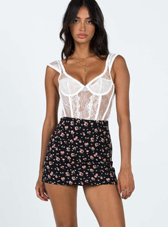 Front view of model wearing  front Selby Mini Skirt Black Floral Princess Polly  Mini Skirts 