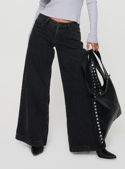 front view of model wearing Princess Polly Ribbon Stamp Wide Leg Jeans Washed Black Low Rise Jeans 