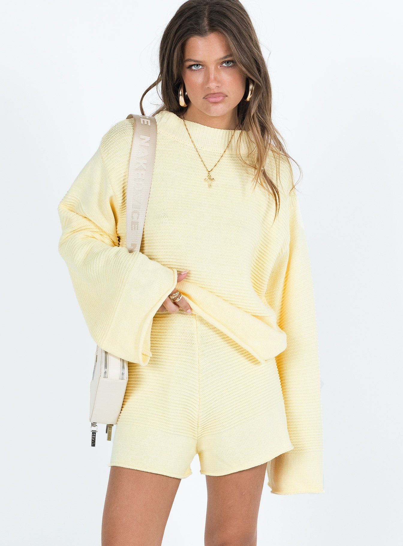 Matching set Knit material Sweater Drop shoulder Shorts High rise Thick elasticated waistband Good stretch Unlined