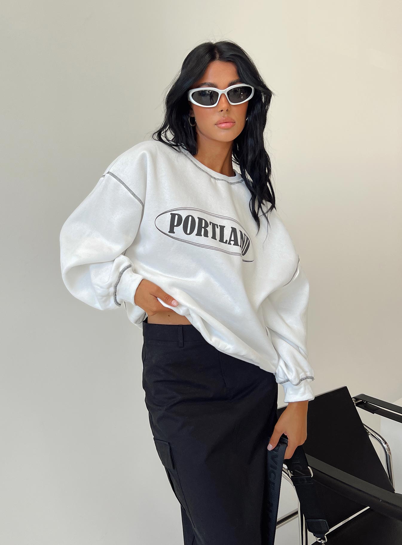 side view of model wearing Princess Polly Portland Oversized Crewneck Sweatshirt White 