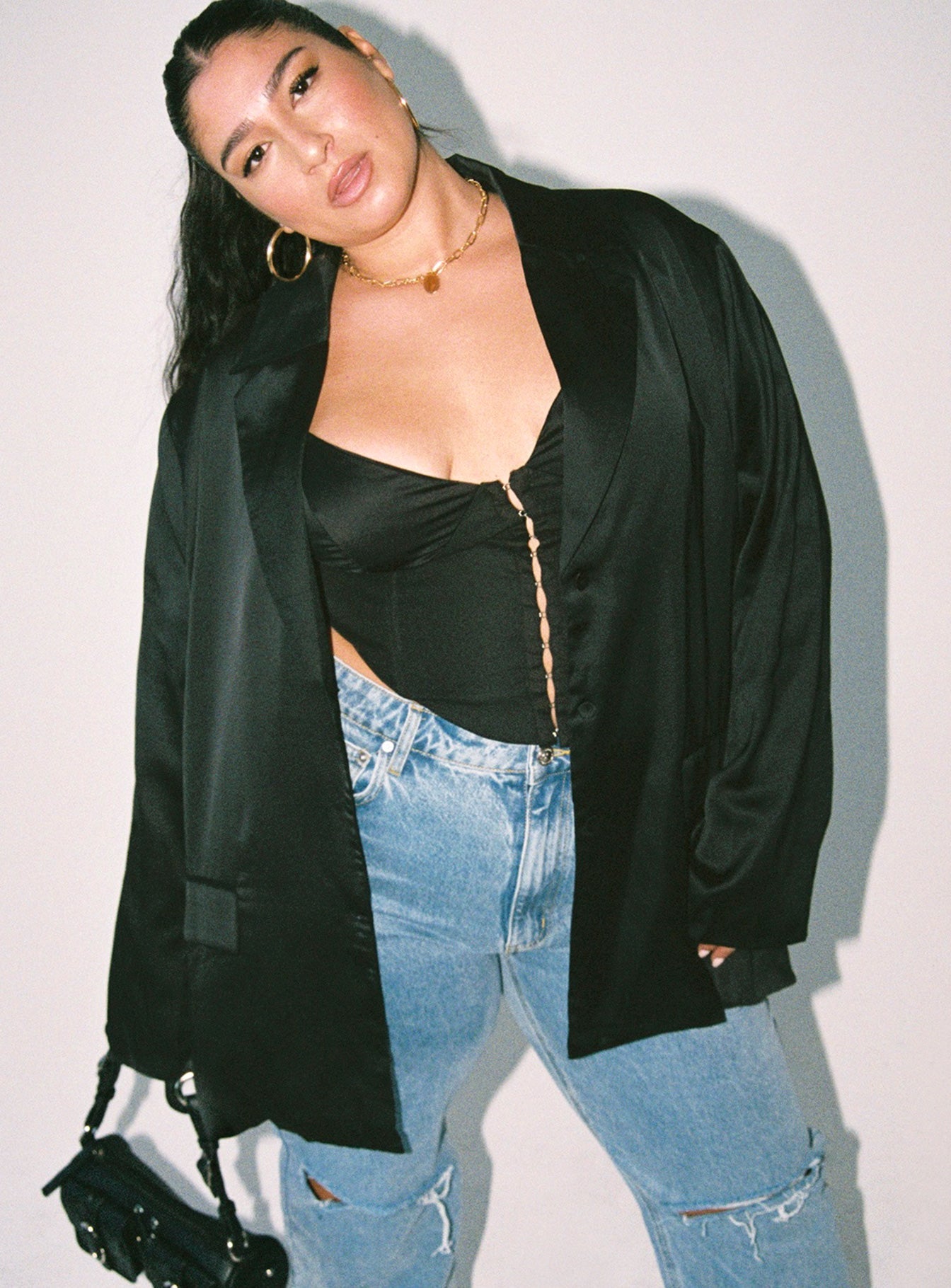 Blazer Satin material Lapel collar Button fastening at front Twin front pockets Slit at back Non-stretch Fully lined