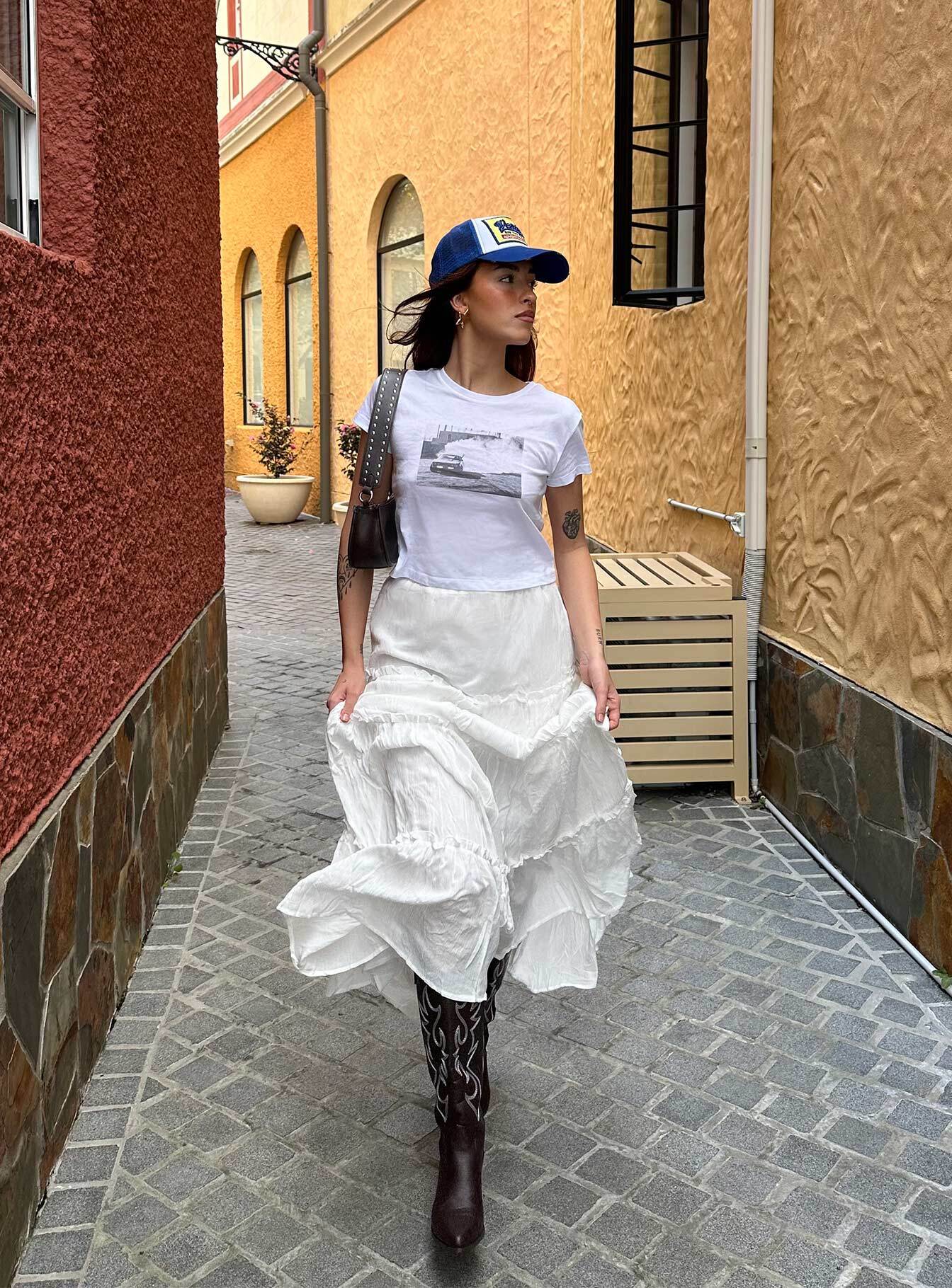   front view of model wearing Princess Polly Miriah Maxi Skirt White Petite Maxi 