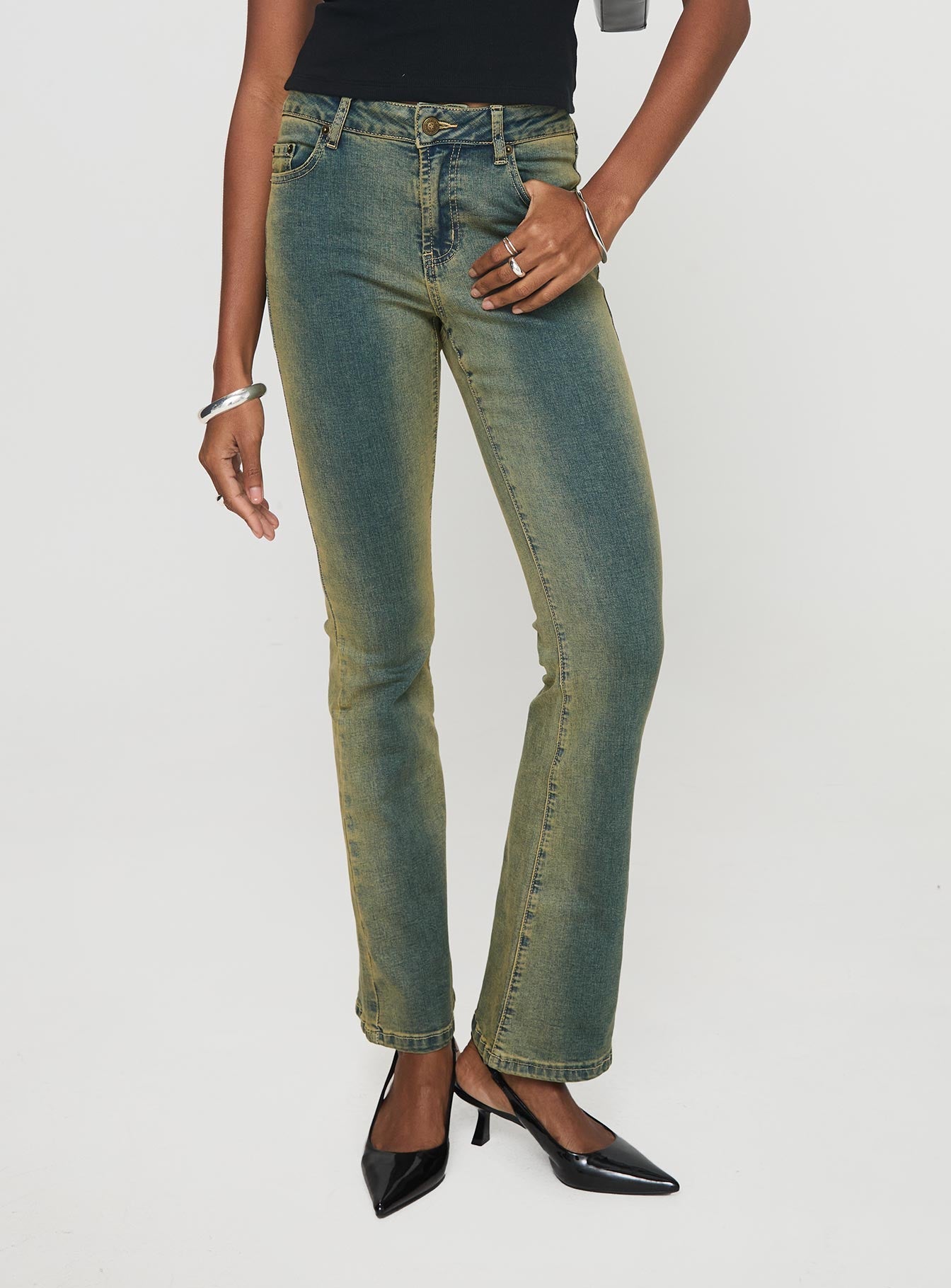 front view of model wearing Princess Polly Sandman Flare Jeans Antique Wash Mid Rise 
