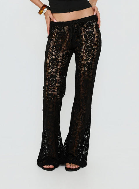 back view of model wearing Princess Polly Rosadonna Lace Flare Pants Black Low Rise Pants 