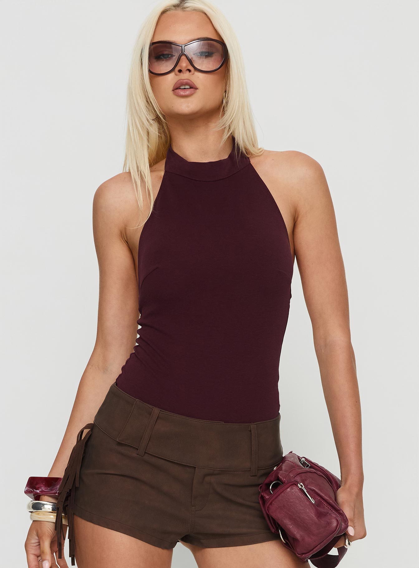 front view of model wearing Princess Polly Claramay High Neck Bodysuit Purple Sleeveless 