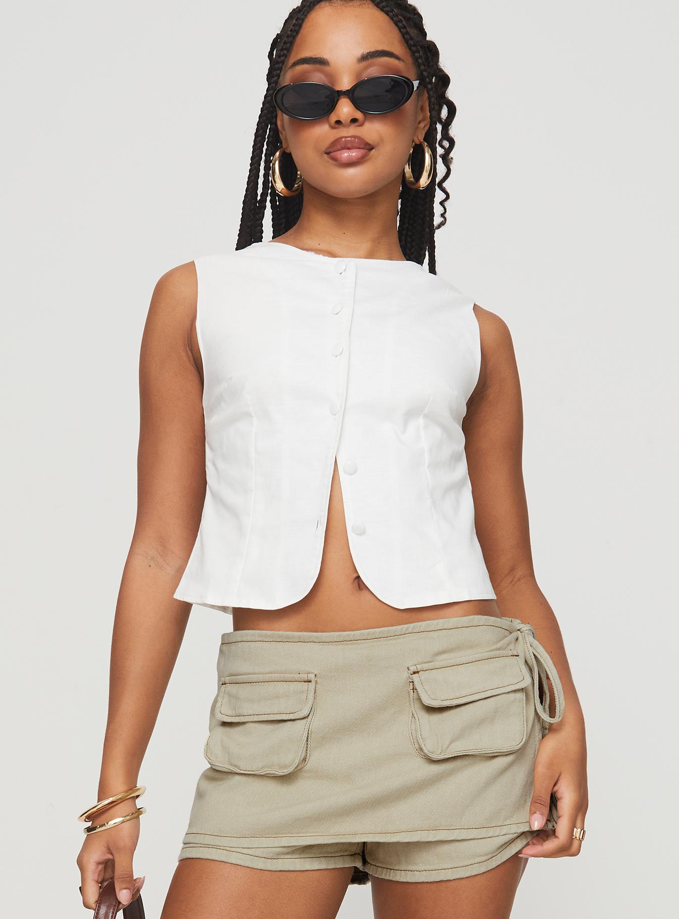 front view of model wearing Princess Polly Aguilera Top White Sleeveless Crew Neck 