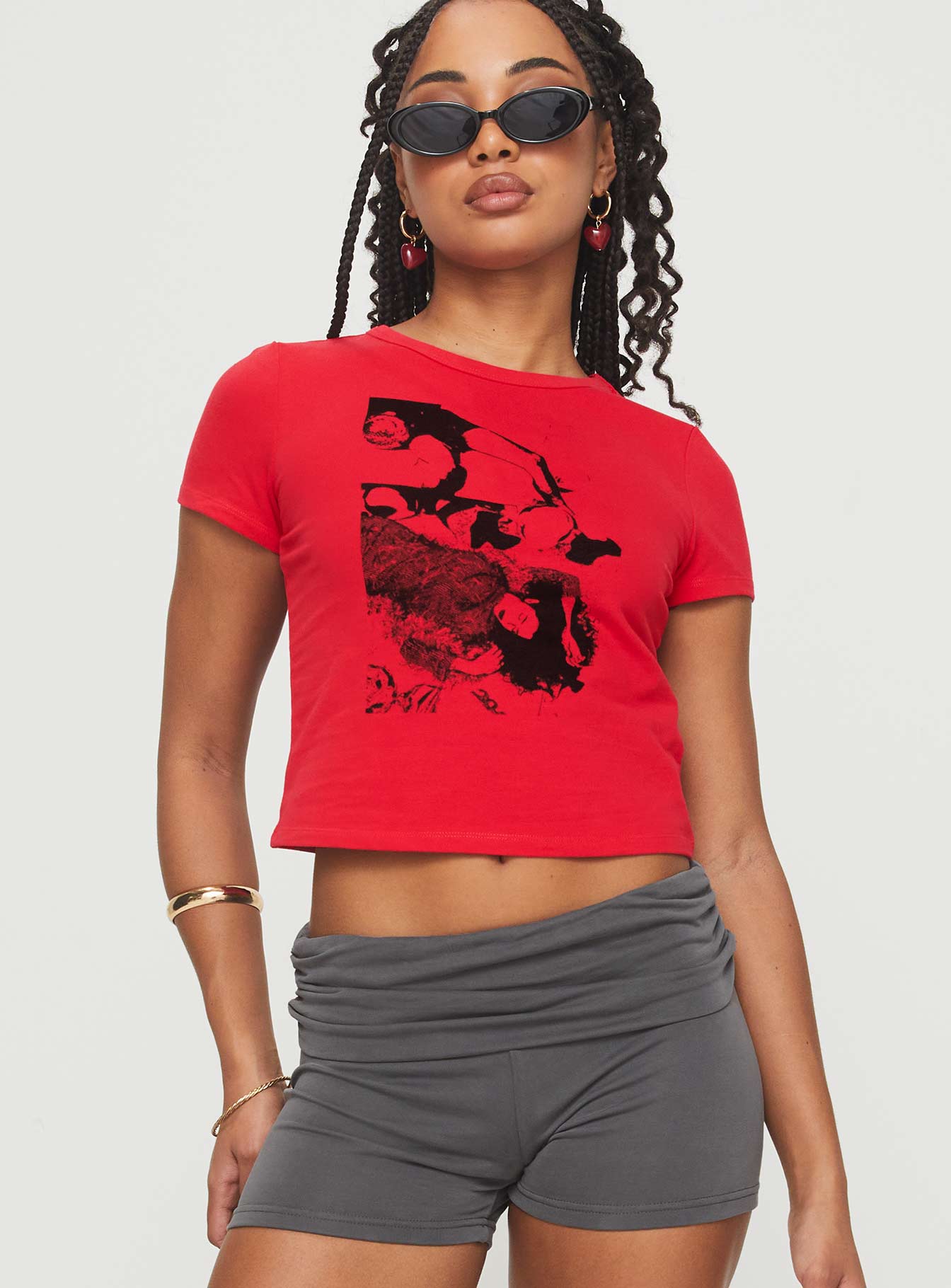 front view of model wearing Princess Polly Akeko Tee Red Short Sleeves Crew Neck 
