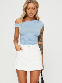 front view of model wearing Princess Polly Heuston Denim Skort White Denim High Waisted Shorts 