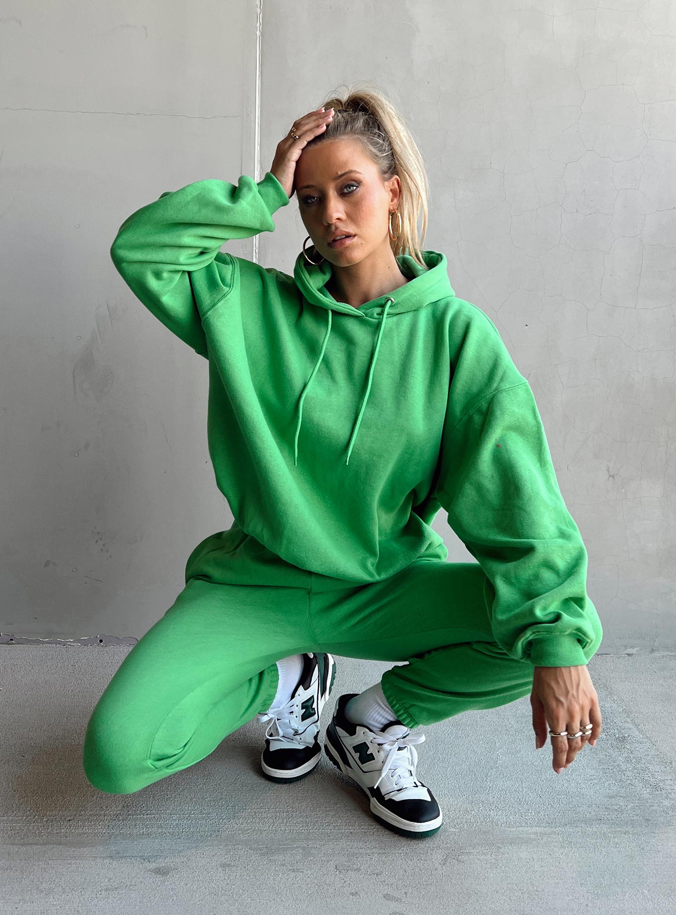 front view of model wearing Princess Polly Ritu Oversized Hoodie Green 