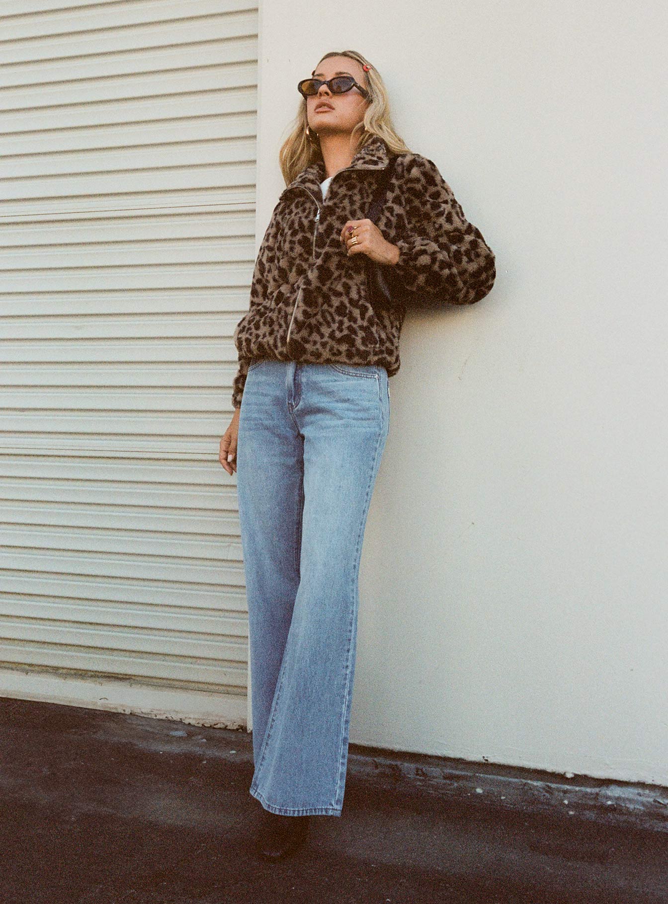 back view of model wearing Princess Polly Colemane Mid Rise Denim Jeans Angel Blue High Waisted 